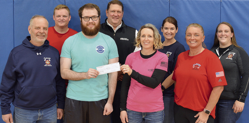 Fire/Rescue weight loss winners donate funds