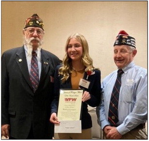 Madison Gompert (center) with her state award.