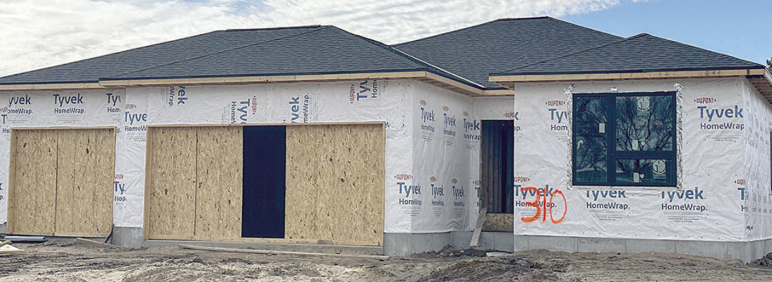FRONT FACADE of one of the AEDC spec homes at 11th and State Street.