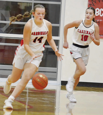BOONE CENTRAL’S Ciera Baker (14) and Norah Frey (10) bring the ball up the floor during Thursday night’s win over Columbus Lakeview. Photo courtesy of Boone Central Yearbook staff