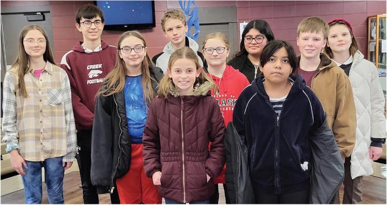 IN SPELLING CONTEST -- St. Edward students competing in the Boone County Spelling Contest on Jan. 24 were (back, l.-r.) Bristol Laska, Zaiden Hueman (winning second place), Bentley Roan, Yoselin Herrera and Anhelina Umanska; (middle rorw) Rosie Labenz, Isabelle Laska and Bennett Werts; (front) Brooklyn Tenski and Kalany Irineo.