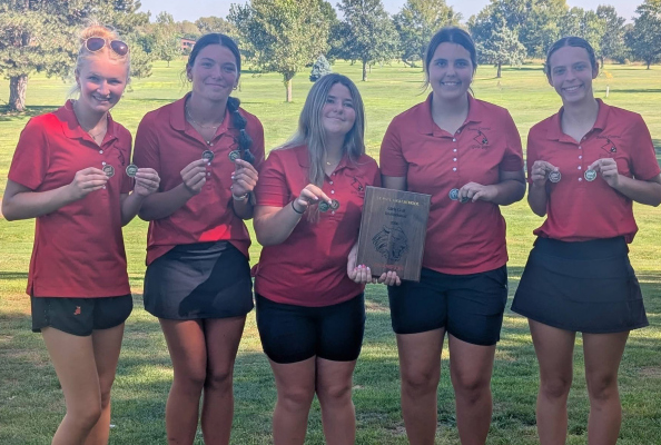 Varsity Girls Golf after St. Paul meet, with their first place plaque and medals, (l to r): Ella Gompert, Ashlynn Naber, Brooklyn Krohn, Molly Harris, and Maddie Kuta.
