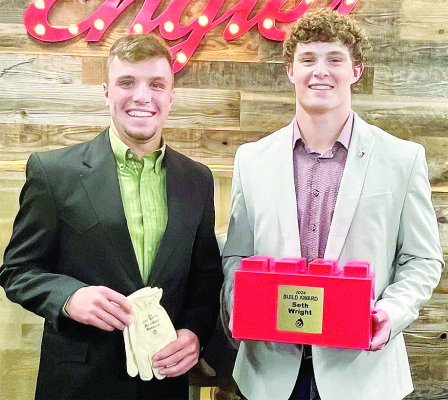 AWARD WINNERS -- Braden Benes, left, and Seth Wright, right, with their Pillar awards.
