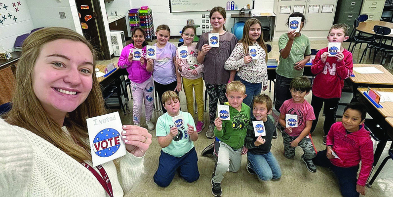 ELEMENTARY VOTING -- St. Edward third through sixth graders cast their own ballots on Nov. 5 to learn more about the democratic process.