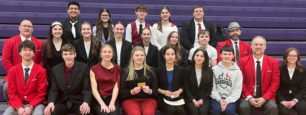 The Cardinal Speech team includes, front row right to left: Coach Curtis Luettel, Grant Kuta, Madison Gompert, Addyson Winter, Jordan Patzel, Eloise Martinez, Lucas Frey, Coach Joel Sup, Coach Taylor Beierman; second row: Coach Andrew Devine, Katelyn Curry, Brittany Sup, Sydney Spangler, Kailyn Choat, Alexis Pedro, Kaleb Wright, Coach Aaron Wyatt; and top row: Edwin Naranjo, Makenna Devine, Jacob Smith, Audrey Meyer, Riley Lordemann