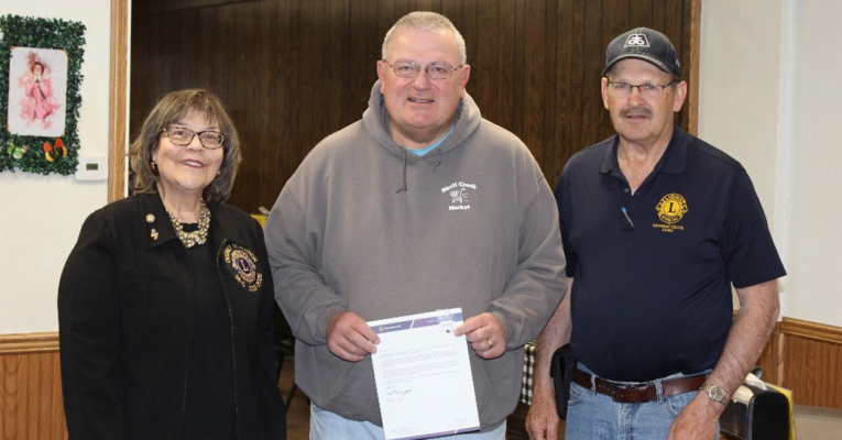 District Governor Karen Jackson presented a chevron denoting 10 years of service to Newman Grove Lion Tom Temme during the club’s March 11 meeting. Also taking part in the presentation was club president Randy Benson. Governor Jackson also recognized Dennis McCloud, who could not attend the meeting, for 40 years as a Lion. Photo courtesy of District 38-O Lions
