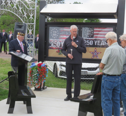 Deacon John Starman blessing the new installments at the ceremony.