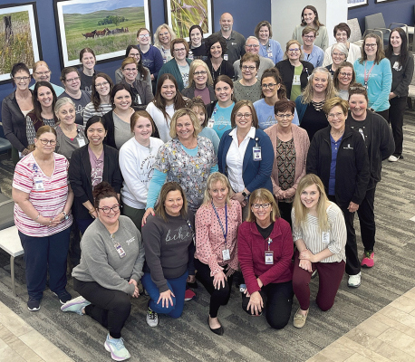 BCHC staff celebrate the latest Top 20 award.
