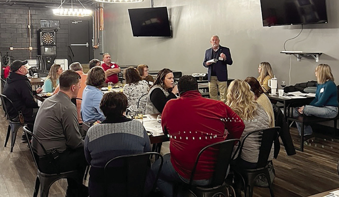 ECONOMIC DEVELOPMENT MIXER -- Todd Duren of Loup Public Power District explains the power company’s programs for economic development throughout its service area.