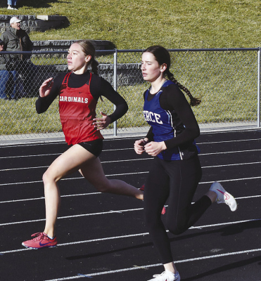 Card KayLee Miller placed a close second to Abbie Cone of Pierce in the Wayne Blue Devil Invite 800 meter run. (Photo, Nolan Vandenburg, Boone Central Schools)