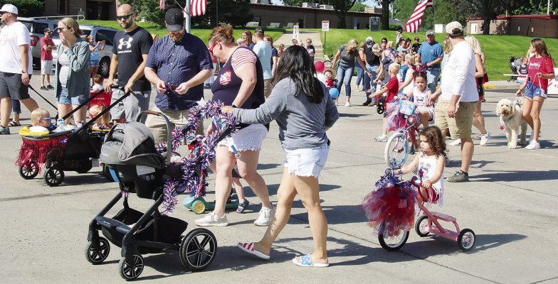 OPENING EVENT -- Many children and parents took part in the annual July 4th Kiddie Parade last Thursday on Church Street.