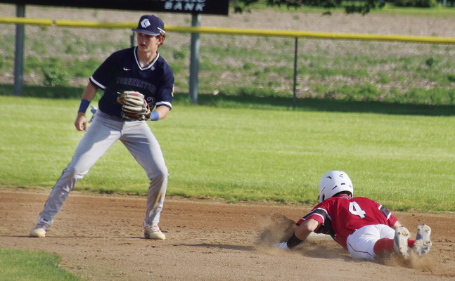 SAFE AT SECOND -- Albion Cornerstone Senior Keaton Hunt beats the throw by a wide margin in Sunday’s game against the York Seniors.