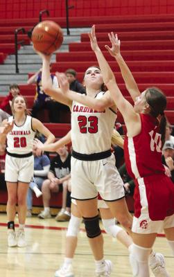 Cardinal freshman Addy Hedlund goes for a bucket during action in the 2024 Mid-State Conference tournament. (Sydney Patzel/Karla Patzel)