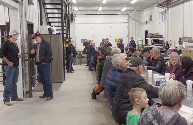 MANY CUSTOMERS and friends were on hand for the grand opening at Town &amp; Country Veterinary Clinic last Wednesday, Jan. 17. Above, a meal was served in the pull-through loading area.