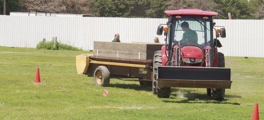 4-H CONTEST DAY -- Saturday, June 8, was busy at the Boone County Fairgrounds with 4-H contests in tractor driving (above), ATV driving, shooting sports and the bicycle rodeo. Results will be announced at the upcoming Boone County Fair.