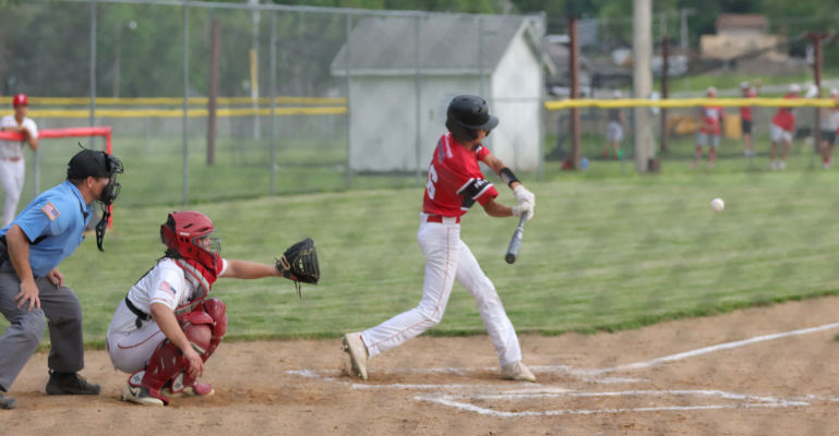 Albion’s Wade Rother times his swing to meet a Plainview pitch in last week’s Junior Legion action at the Leon Nelson field.