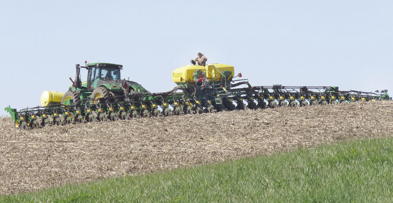 Farmers attempting to plant