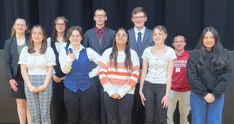 The St. Edward Team, Back Row: Rebekah Ketelsen (POI 4th and 2nd Extemp), Lakin Prososki (Serious Prose), Noah Ketelsen (Humorous Prose 4th and Extemp 3rd), Kalvin Sindelar(OID 6th, Humorous Prose Champion); and Front row: Josie Sock(OID 6th and Serious Prose 5th), Claire Tibor (OID 6th and POI 2nd), Kaylee Applegarth (Poetry 4th Unified), Korina Bittner (Poetry 2nd), Luke Laska (Entertainment), and Emily Cruz Sanchez (Student Manager).