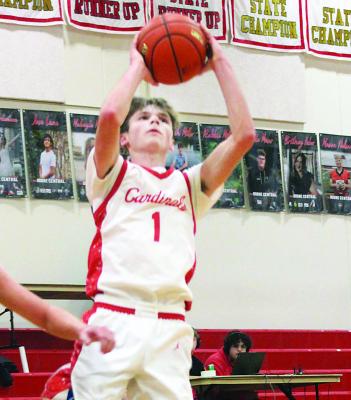 Connor Christo charges to the hoop for two points during Boone Central’s victory over Crofton in the first round of the Mid-State Conference tournament. (Sydney Patzel/Karla Patzel)
