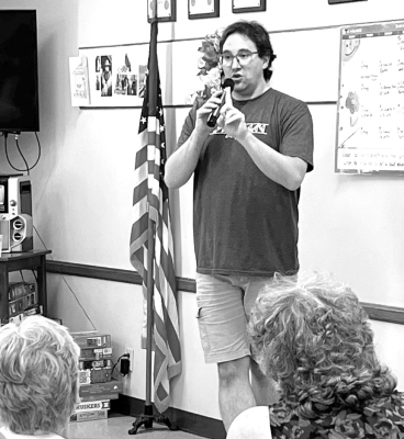 Flanagan gives quilt presentation to “Pals”