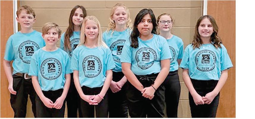 IN SING AROUND NEBRASKA -- Eight St. Edward students were part of “Sing Around Nebraska’ at Central City on Saturday, Jan. 26. A total of150 fourth, fifth and sixth grade students joined voices. St. Edward students participating were (back, l.-r.) Jacob Reardon, Payton Kuhl, Ali Werts and Isabelle Laska; (front) Blair Pierce, Hayley Werts, Kalany Irineo Gallardo and Kaylynn Steensnes. Guest director was Dr. Clark Roush from York University. Courtesy Photo