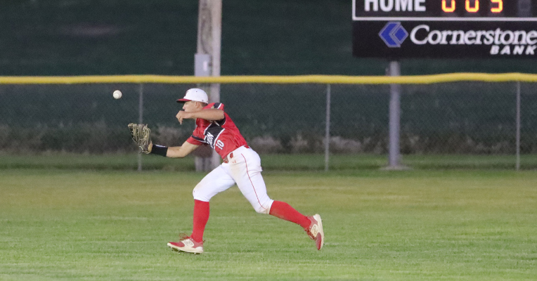 #10 Jack Molt grabs a centerfield fly ball against O’Neill.