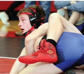 Boone Central freshman Daron Dozler has this Dale Bonge Invitational opponent all wrapped up. (Photo, Rose Buhlmann)