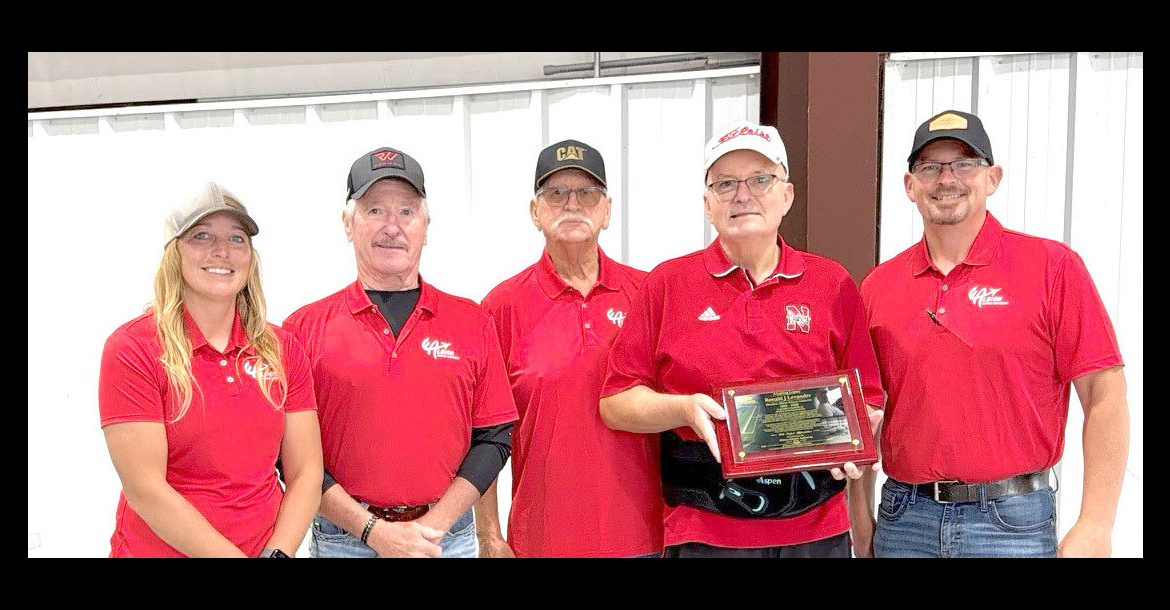 Albion Airport Authority members present a plaque honoring Ron’s 40-plus years of commitment and leadership on the airport authority. Pictured are: Jessica Krohn, Rick Schack, Bob Sandman, (Ron Levander) and Tony Levander. Jim Meyer is the other airport authority member that was unable to attend.